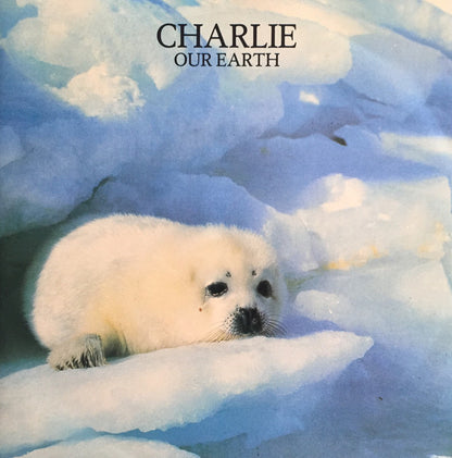 Charlie (19) : Our Earth (7", Single)