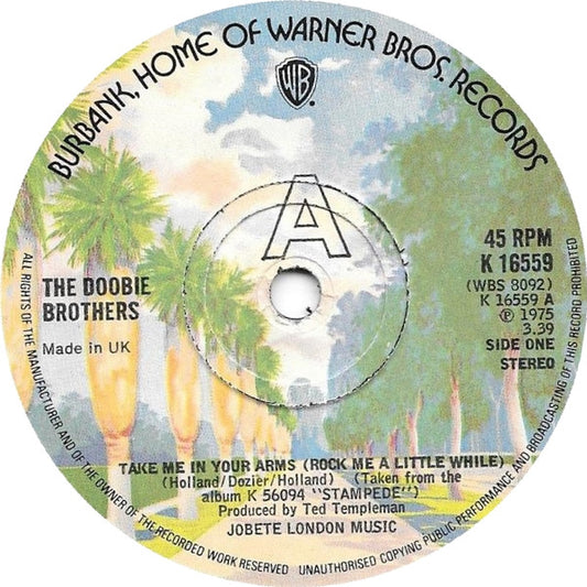 The Doobie Brothers : Take Me In Your Arms (Rock Me A Little While) (7", Single, Sol)